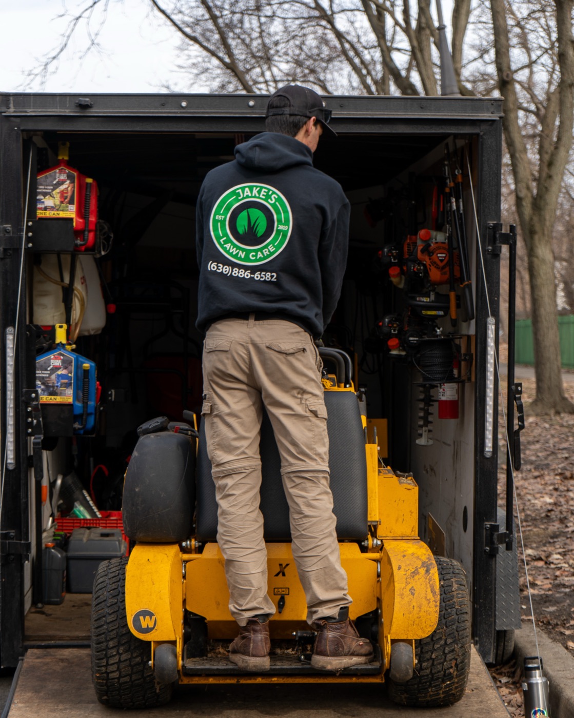Jake Matarazzo, owner of Jake's Lawn Care LLC, on his zero-turn mower in Chicagoland Illinois